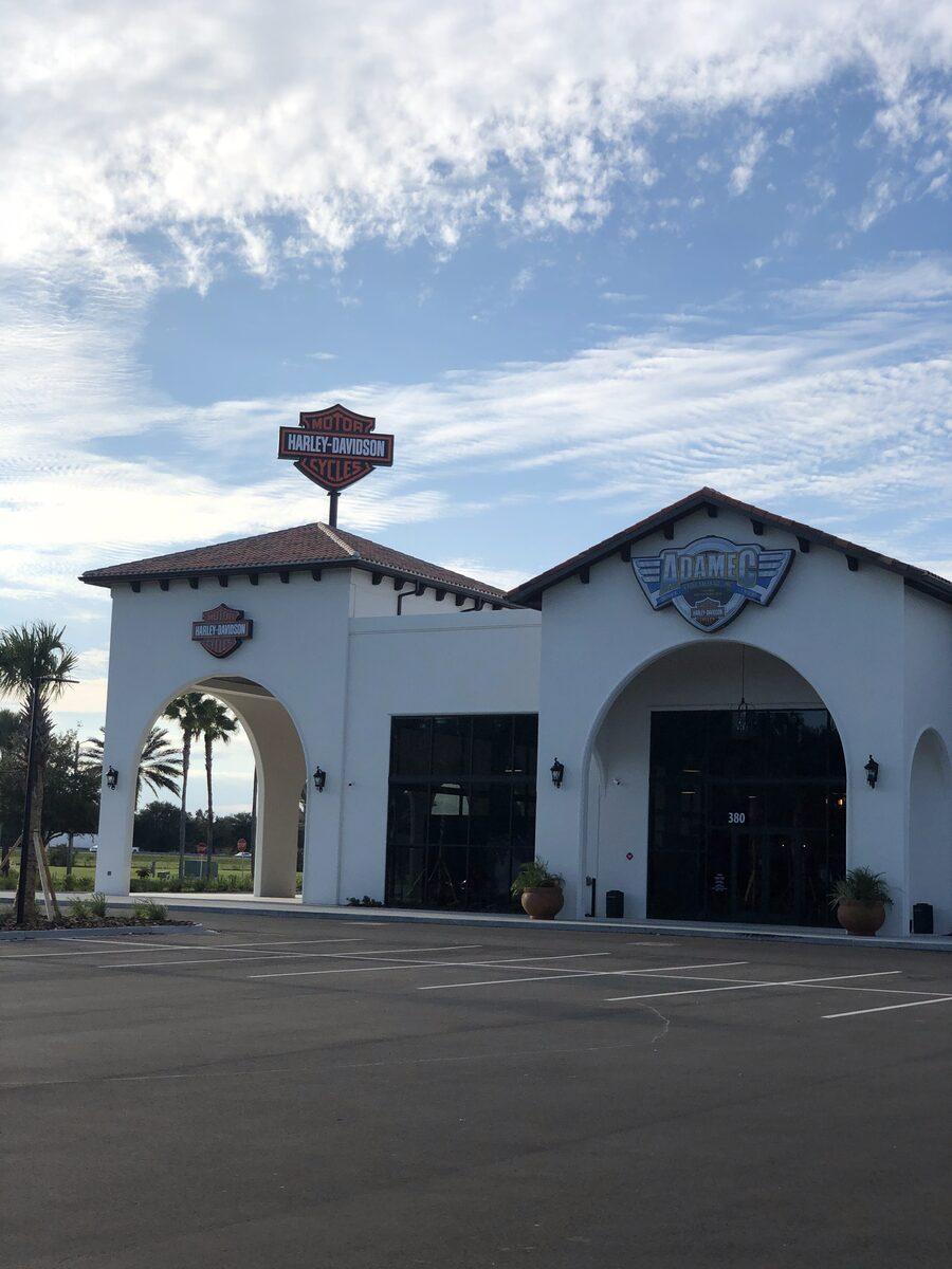 High-rise pylon sign and wall signs for Adamec in St. Augustine FL — by CG Signs