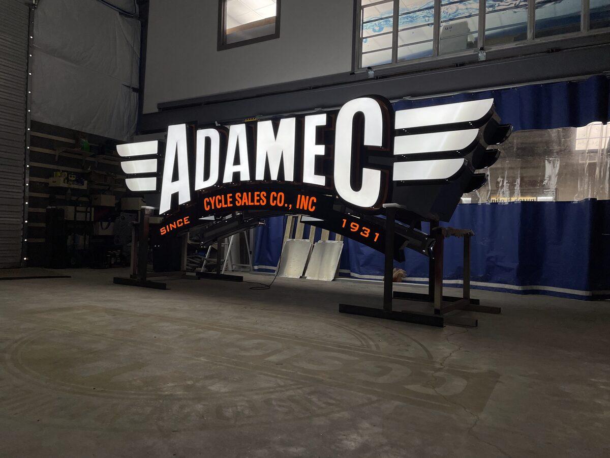 Custom-fabricated pylon sign cabinet with channel letters for Adamec on Atlantic Blvd in Jacksonville FL — by CG Signs