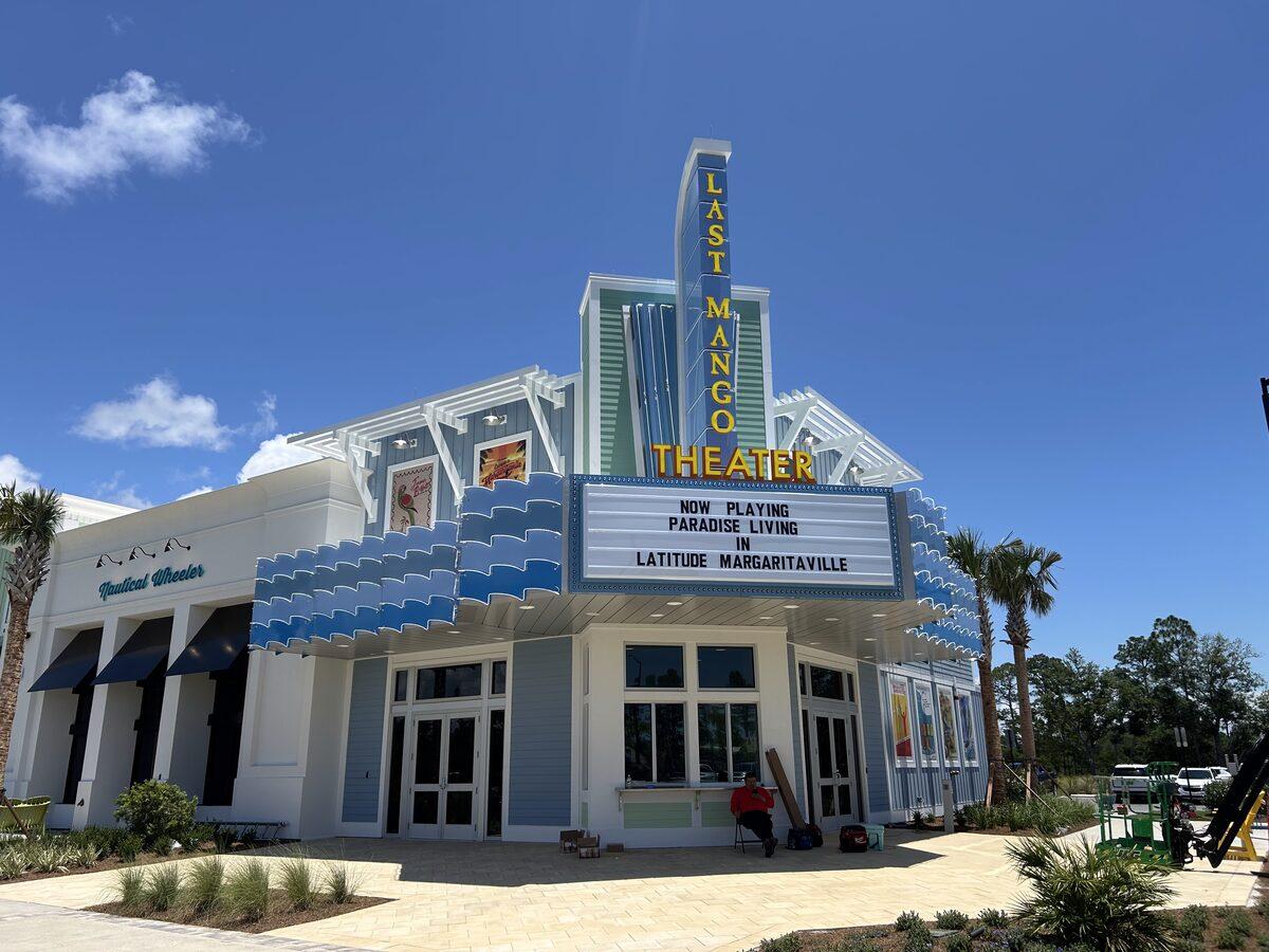 Custom-fabricated marquee and blade sign with neon, aluminum trellis, and tension banner sign frames for Latitude Margaritaville Watersound, FL — by CG Signs