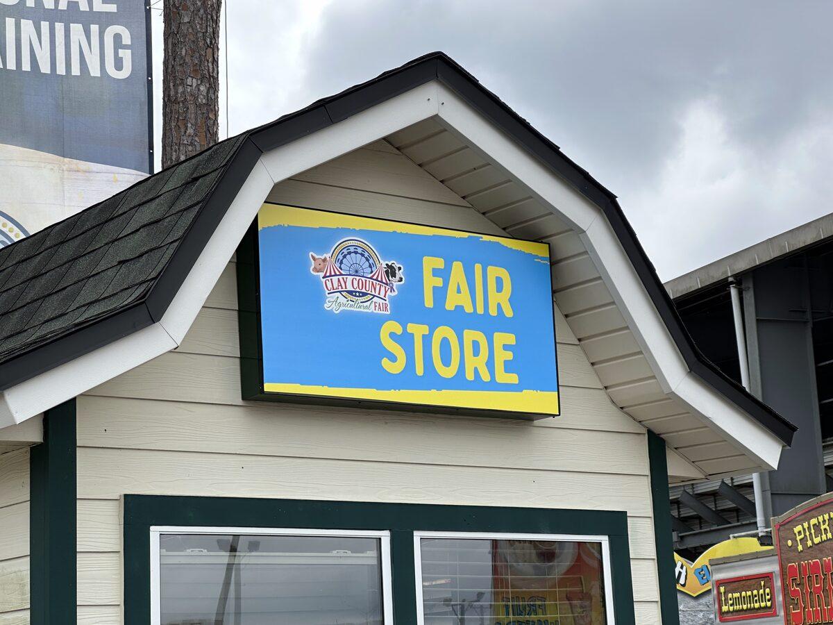 Custom illuminated cabinet sign for Clay County Fairgrounds — Custom Graphics & Sign Designs