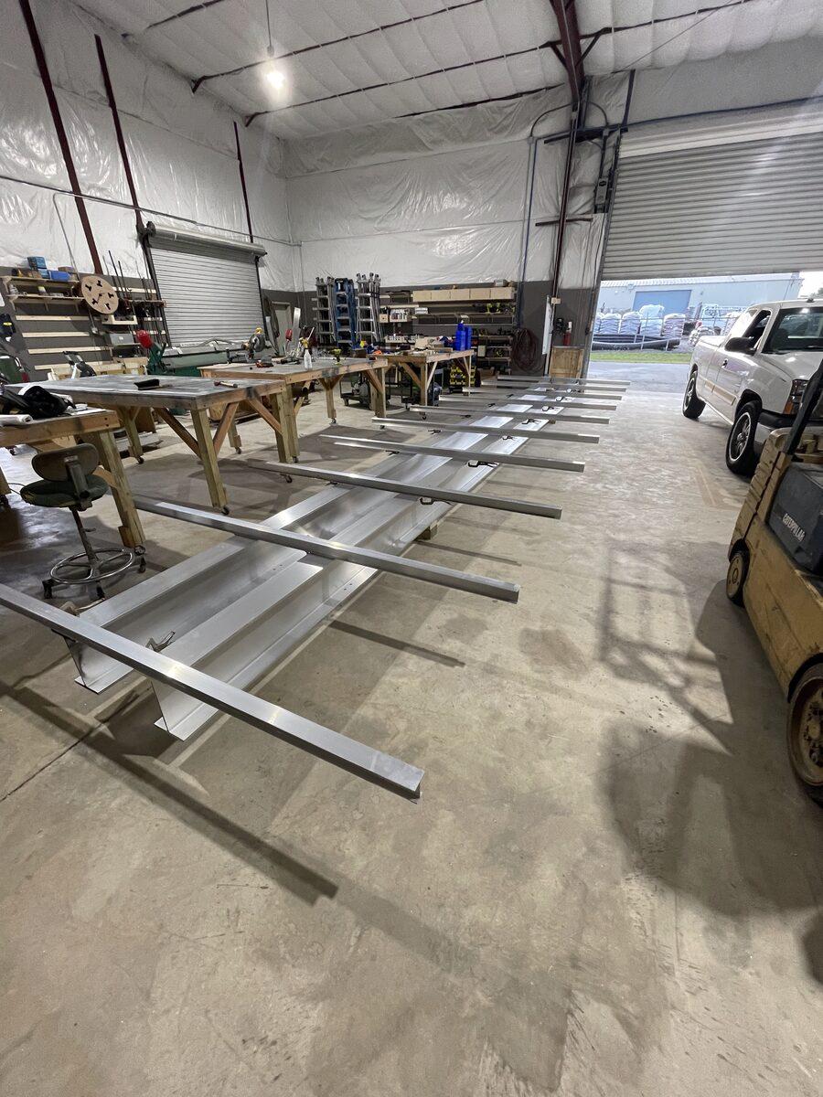 Fabrication of the aluminum trellis accent for Dennis+Ives — CG Signs Orange Park shop