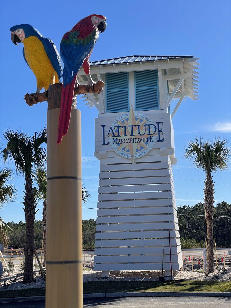 Layered PVC Latitude Margaritaville roof identity sign on the Sales Center — Watersound, FL — by CG Signs