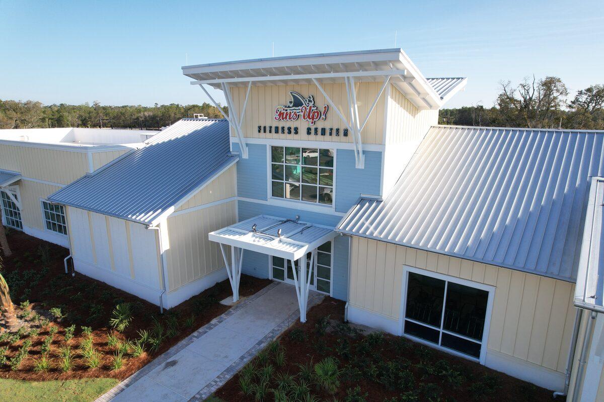 Aerial view of custom aluminum brackets and canopy fabricated by CG Signs at the Fins Up Fitness Center, Latitude Margaritaville Watersound, FL