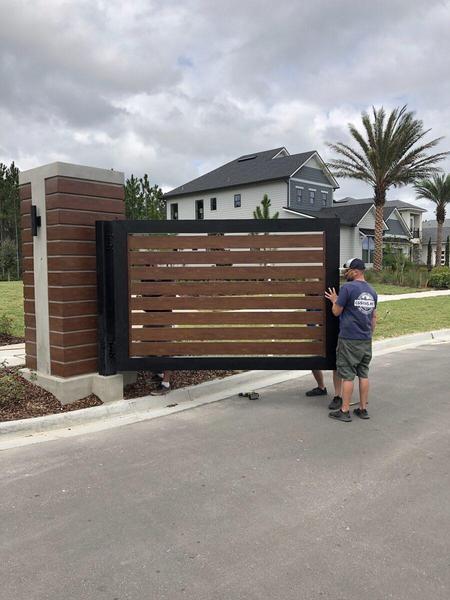 Fabricated aluminum gates with Knotwood slats for Edison by Toll Brothers in eTown — Custom Graphics & Sign Designs