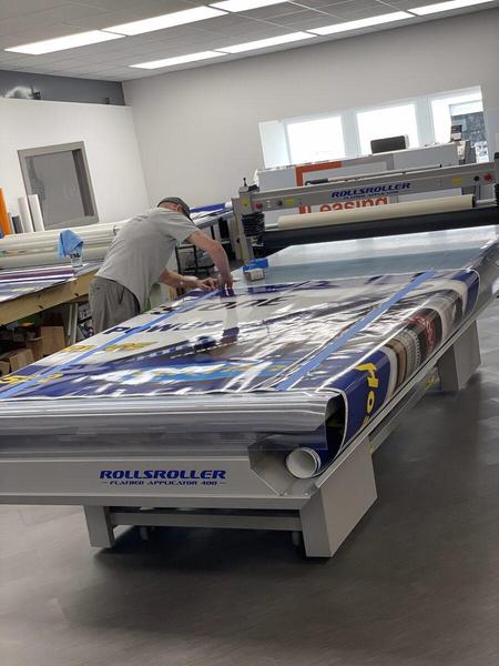 Production of Box Truck wrap panels in our Graphics Production room — Custom Graphics & Sign Designs, Jacksonville FL
