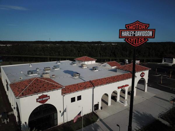 High-Rise Pylon Sign and Wall Signs for Adamec in St. Augustine — Custom Graphics & Sign Designs