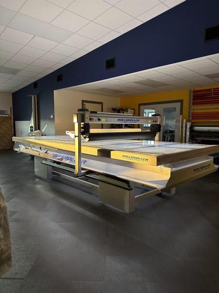 Image of our Rolls Roller application table in our Graphics Production room — Custom Graphics & Sign Designs, Northeast Florida