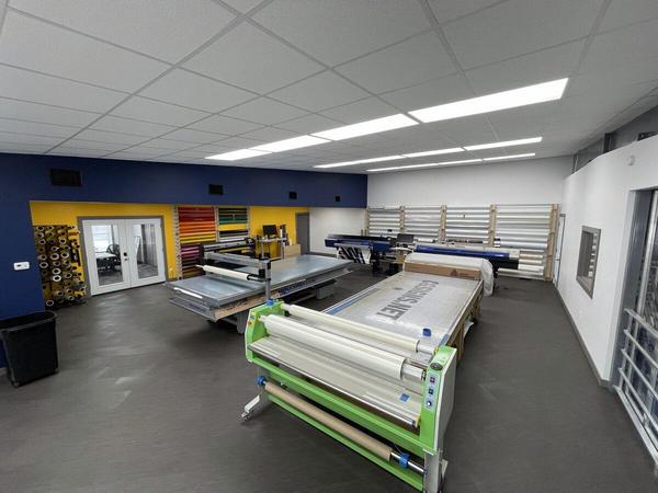 Wide Angle view of our Graphics Production room — Custom Graphics & Sign Designs, Northeast Florida