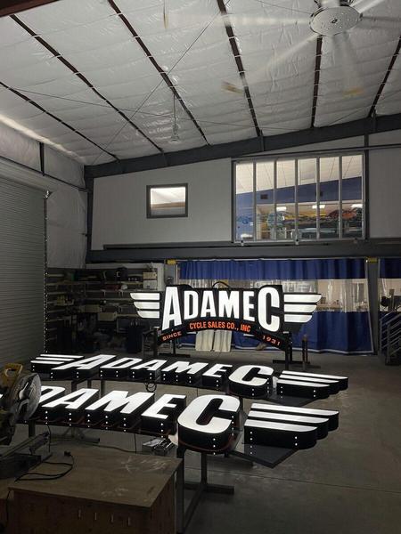 Custom fabricated pylon sign cabinet and wall signs with Channel Letters for Adamec on Atlantic Blvd in Jacksonville, FL — Custom Graphics & Sign Designs