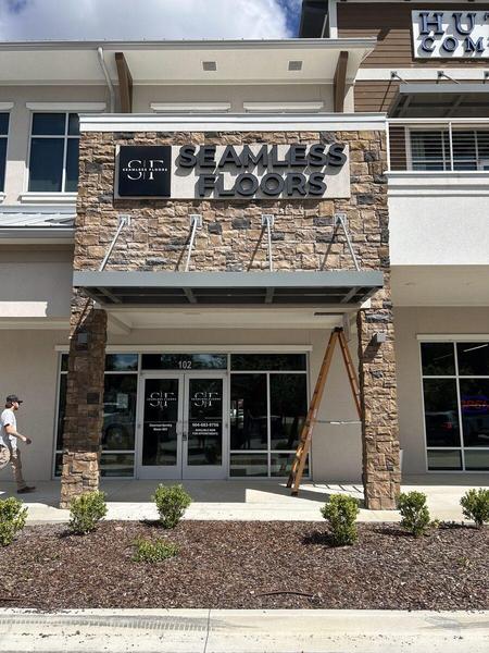 Flush mounted channel letters with day/night faces for Seamless Floors — Custom Graphics & Sign Designs