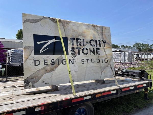 Black vinyl graphics applied to stone substrate — Custom Graphics & Sign Designs, Jacksonville FL