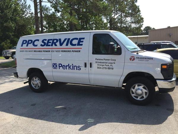 Spot Graphics on Ford Econoline Van — Custom Graphics & Sign Designs, Jacksonville FL